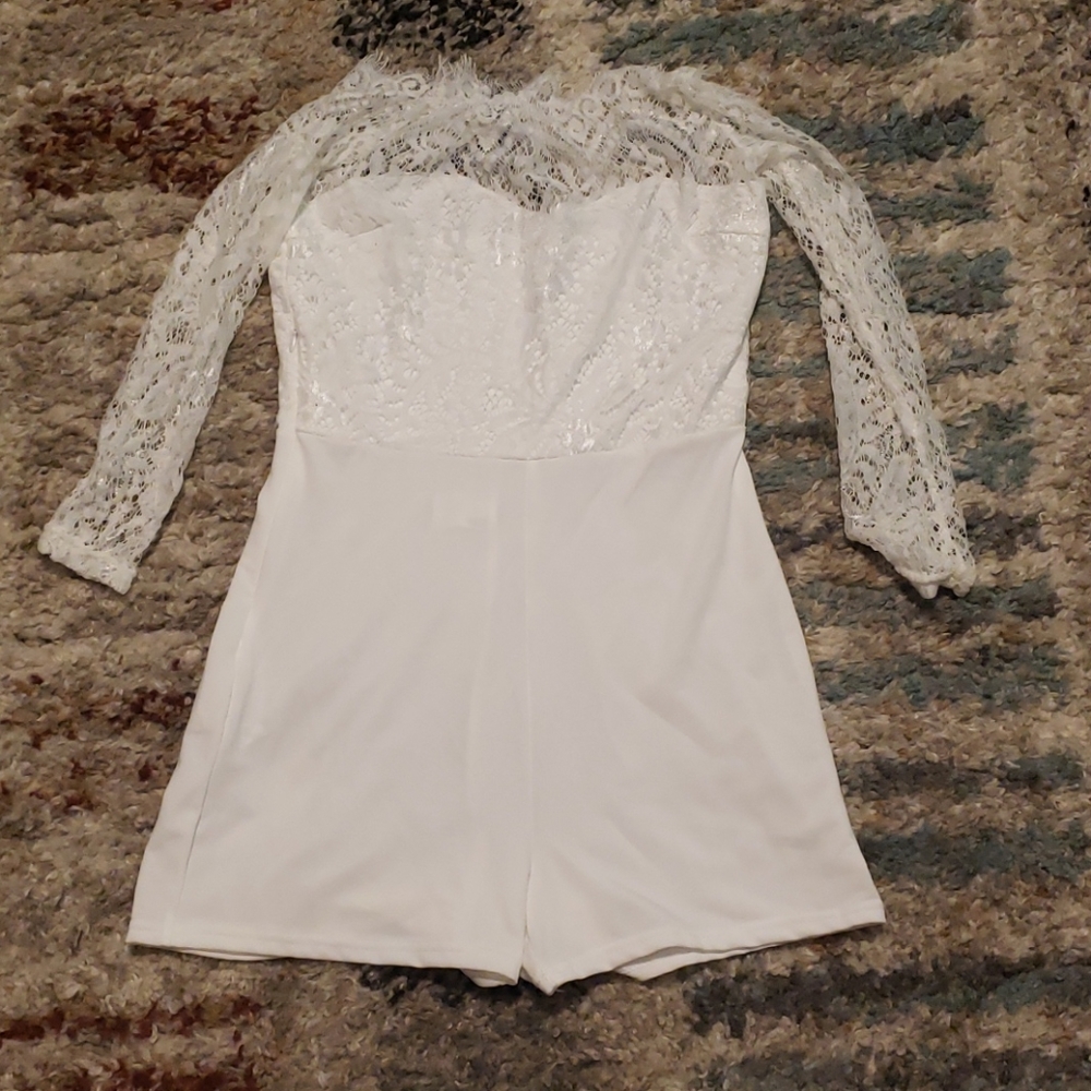 Very elegant white rompers custom made